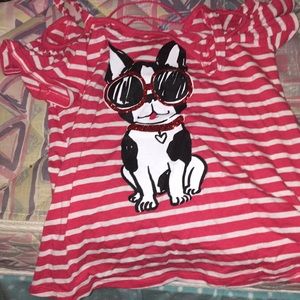 Red striped shirt with dog.